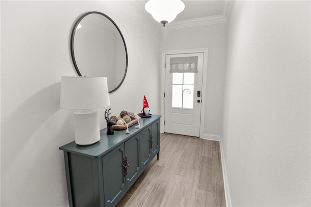39593 Fly Creek Rd, Ponchatoula, LA 70454 - entryway featuring crown molding, light wood-type flooring, and baseboards