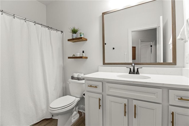 39593 Fly Creek Rd, Ponchatoula, LA 70454 - bathroom with vanity, toilet, wood finished floors, and curtained shower
