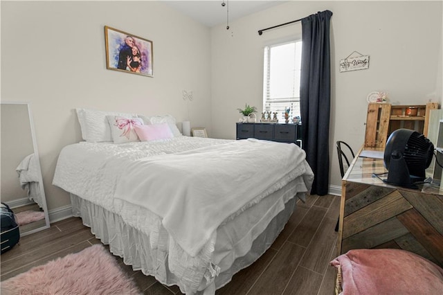 39593 Fly Creek Rd, Ponchatoula, LA 70454 - bedroom featuring wood tiled floors and baseboards