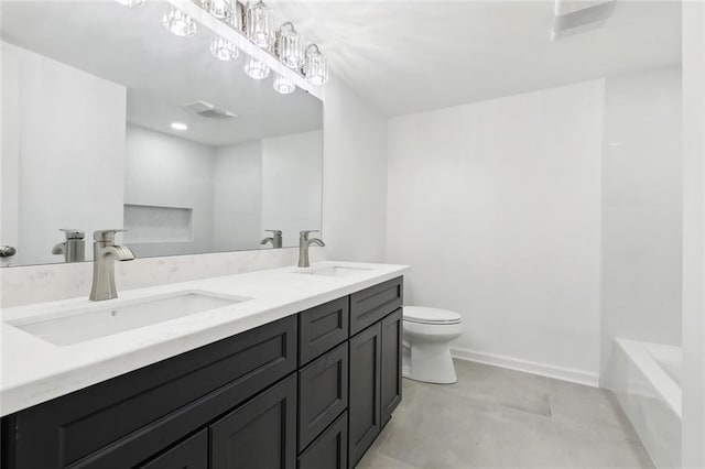 1221 Gaudet Dr, Marrero, LA 70072 - full bathroom featuring double vanity and concrete flooring