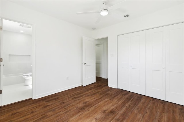 1221 Gaudet Dr, Marrero, LA 70072 - unfurnished bedroom with wood finished floors, connected bathroom, a closet, and a ceiling fan