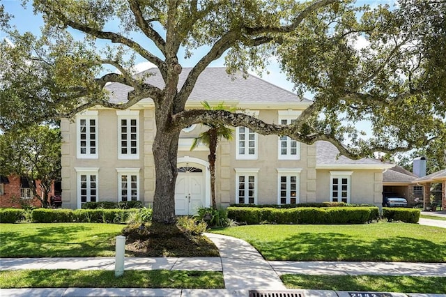 2442 Killdeer St, New Orleans, LA 70122 - view of front of house with a front lawn and brick siding