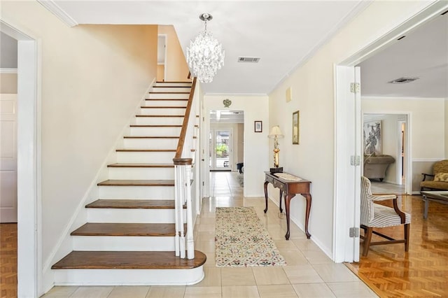 2442 Killdeer St, New Orleans, LA 70122 - stairs featuring ornamental molding, a chandelier, and baseboards