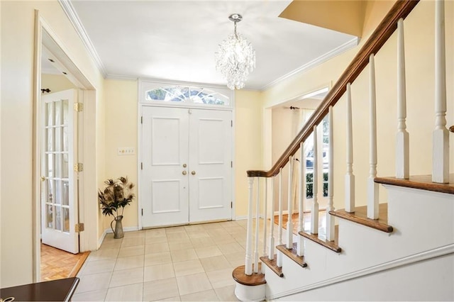 2442 Killdeer St, New Orleans, LA 70122 - foyer with stairway, crown molding, a chandelier, and baseboards