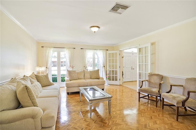 2442 Killdeer St, New Orleans, LA 70122 - living room featuring ornamental molding and french doors