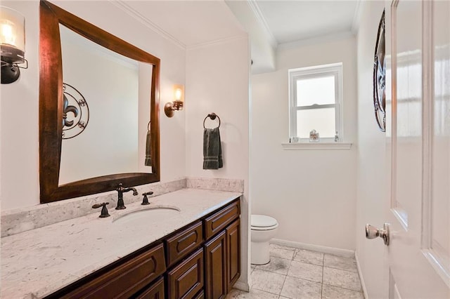 2442 Killdeer St, New Orleans, LA 70122 - bathroom featuring vanity, toilet, baseboards, and crown molding