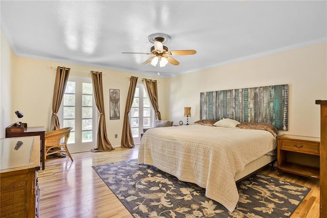 2442 Killdeer St, New Orleans, LA 70122 - bedroom featuring wood finished floors, ornamental molding, and a ceiling fan