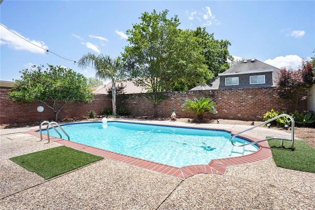 2442 Killdeer St, New Orleans, LA 70122 - view of swimming pool with a fenced backyard