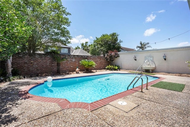2442 Killdeer St, New Orleans, LA 70122 - view of swimming pool featuring a fenced backyard