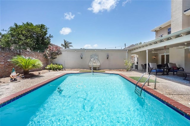 2442 Killdeer St, New Orleans, LA 70122 - view of pool with ceiling fan, a patio area, and a fenced backyard