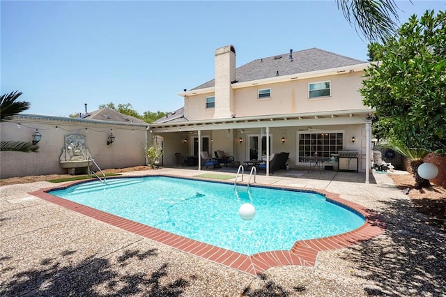 2442 Killdeer St, New Orleans, LA 70122 - swimming pool with a patio area and grilling area