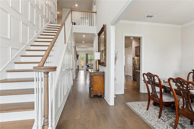9574 W Terran Ln, Waggaman, LA 70094 - entryway featuring stairway, hardwood / wood-style flooring, crown molding, baseboards, and recessed lighting