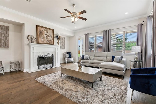 9574 W Terran Ln, Waggaman, LA 70094 - living room with ceiling fan, ornamental molding, a fireplace with flush hearth, dark wood-type flooring, and recessed lighting