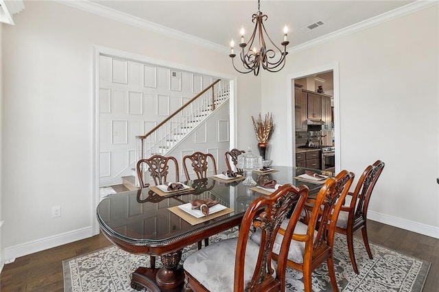 9574 W Terran Ln, Waggaman, LA 70094 - dining area featuring stairway, a chandelier, dark wood-style floors, baseboards, and ornamental molding