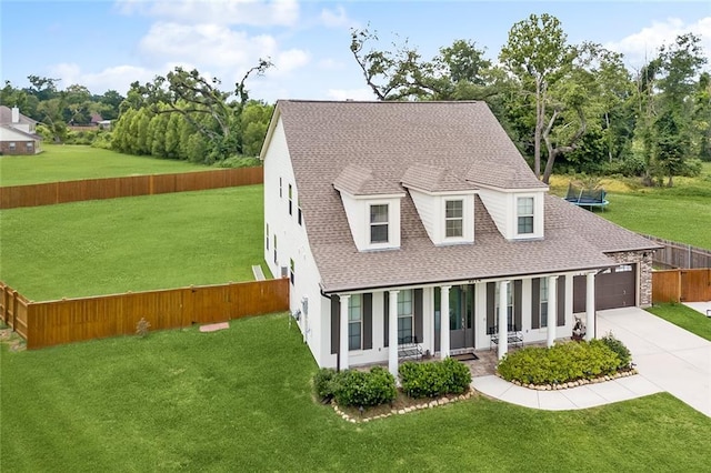 9574 W Terran Ln, Waggaman, LA 70094 - view of front of home featuring a shingled roof, concrete driveway, a garage, and covered porch
