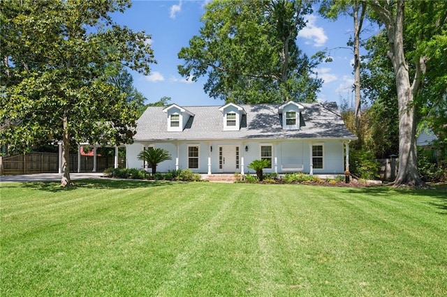 310 Scotchpine Dr, Mandeville, LA 70471 - cape cod home featuring a porch