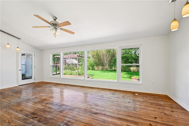 310 Scotchpine Dr, Mandeville, LA 70471 - empty room featuring ceiling fan, vaulted ceiling, and wood finished floors