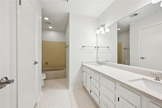 310 Scotchpine Dr, Mandeville, LA 70471 - full bathroom featuring double vanity, recessed lighting, tile patterned flooring, and shower / bathtub combination