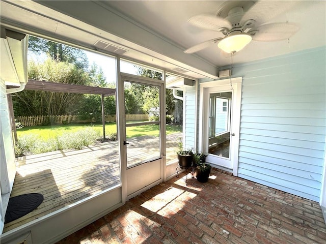 310 Scotchpine Dr, Mandeville, LA 70471 - unfurnished sunroom featuring ceiling fan