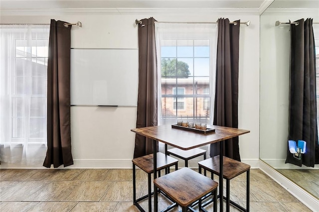 732 Cherokee St Unit 302, New Orleans, LA 70118 - dining room featuring ornamental molding and baseboards