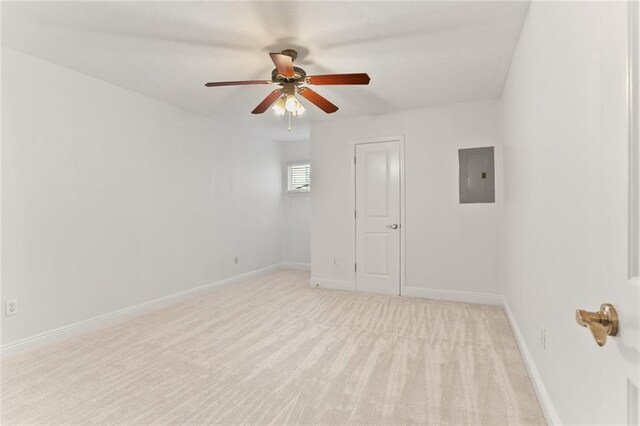 3805 Houma Blvd Unit C101, Metairie, LA 70006 - empty room with electric panel, a ceiling fan, baseboards, and light carpet