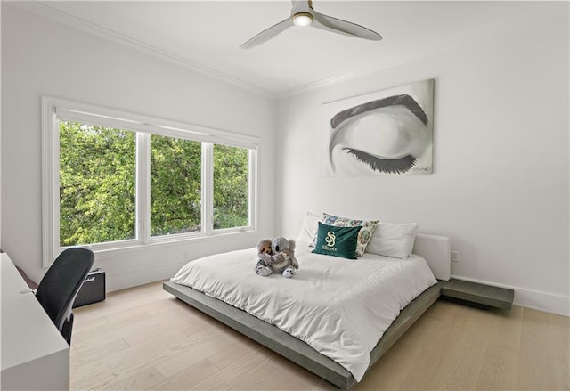 139 Fontainbleau Dr, Mandeville, LA 70471 - bedroom with crown molding, wood finished floors, an office area, and ceiling fan