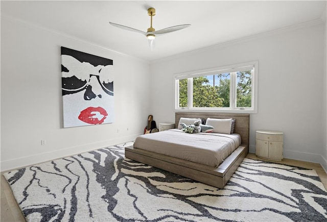 139 Fontainbleau Dr, Mandeville, LA 70471 - bedroom with crown molding, baseboards, ceiling fan, and wood finished floors