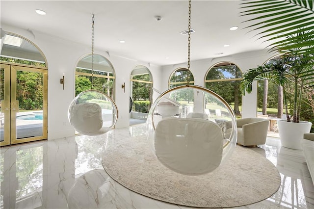 139 Fontainbleau Dr, Mandeville, LA 70471 - detailed view of french doors, recessed lighting, and crown molding