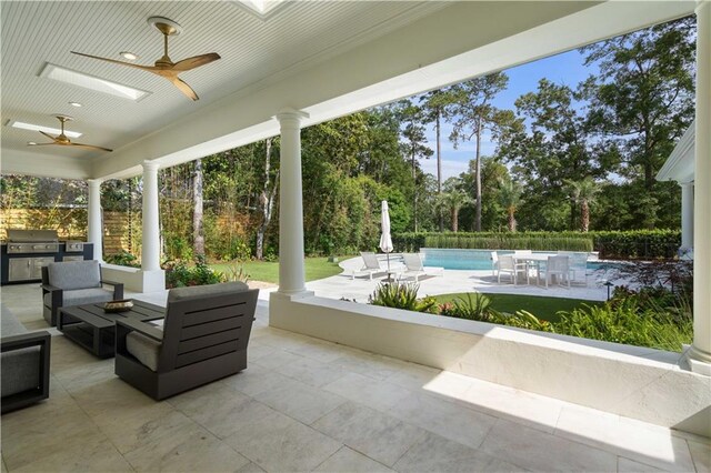 139 Fontainbleau Dr, Mandeville, LA 70471 - view of patio / terrace with a ceiling fan, an outdoor hangout area, and view of scattered trees