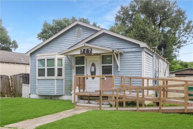 717 E Jefferson Park, Jefferson, LA 70121 - shotgun-style home featuring a deck