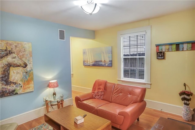 723 Kerlerec St, New Orleans, LA 70116 - living room with wood finished floors and baseboards