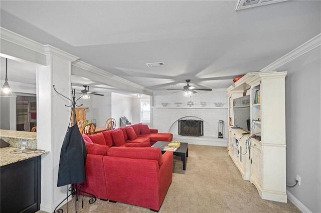 285 8th Street Dr, Ponchatoula, LA 70454 - living area with a ceiling fan, light colored carpet, a brick fireplace, ornamental molding, and baseboards
