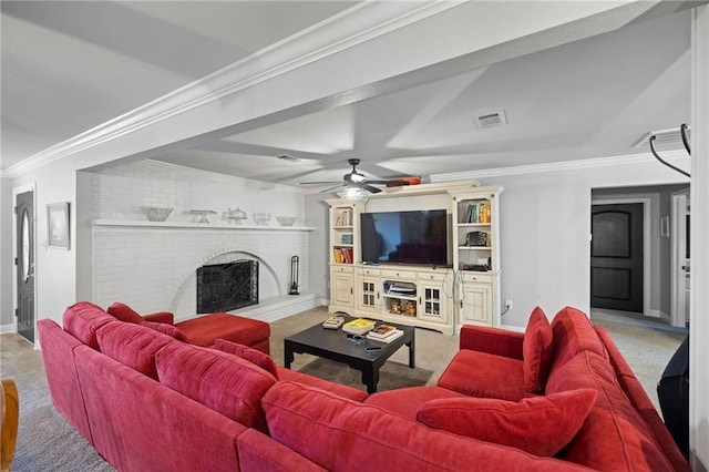 285 8th Street Dr, Ponchatoula, LA 70454 - carpeted living room featuring ornamental molding, a ceiling fan, a fireplace, and baseboards
