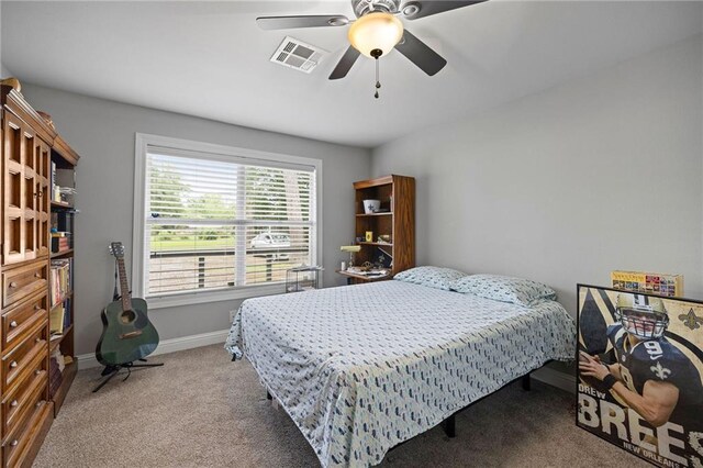 285 8th Street Dr, Ponchatoula, LA 70454 - bedroom featuring carpet, baseboards, and ceiling fan