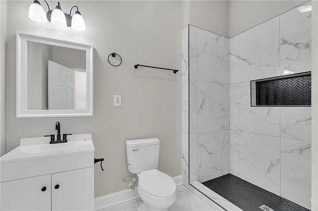 6073 Wickfield Dr, New Orleans, LA 70122 - full bath featuring marble look tiles, toilet, vanity, baseboards, and a tile shower