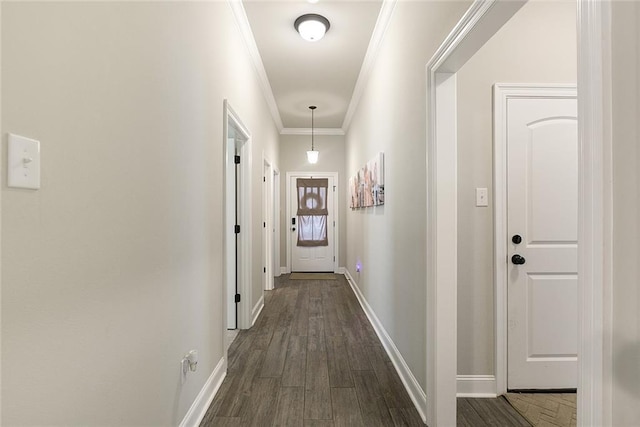 6476 Nesting Dr, Gonzales, LA 70737 - corridor with dark wood finished floors, ornamental molding, and baseboards
