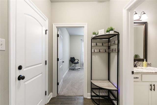 6476 Nesting Dr, Gonzales, LA 70737 - mudroom with dark wood-style flooring and baseboards