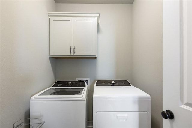 6476 Nesting Dr, Gonzales, LA 70737 - laundry room with independent washer and dryer and cabinet space