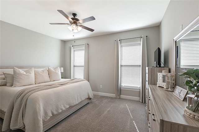 6476 Nesting Dr, Gonzales, LA 70737 - bedroom featuring baseboards, light carpet, and a ceiling fan