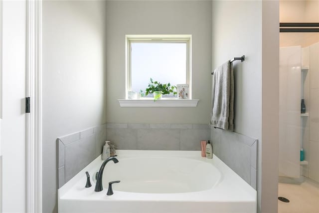 6476 Nesting Dr, Gonzales, LA 70737 - bathroom featuring a bath and a shower stall