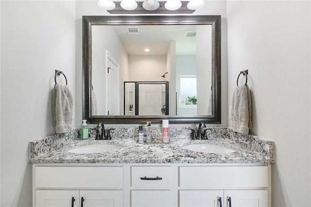 6476 Nesting Dr, Gonzales, LA 70737 - full bath with double vanity and a shower stall