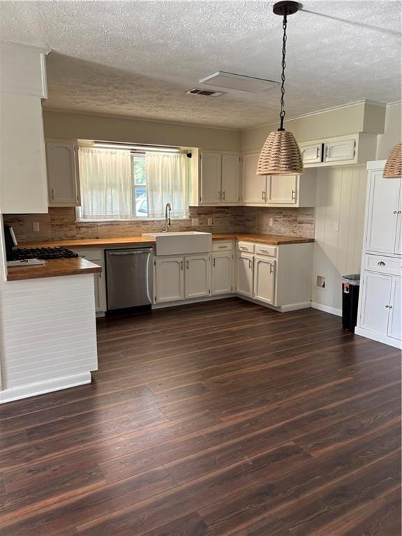 11036 Gulino Rd, Amite, LA 70422 - kitchen featuring dishwasher, a textured ceiling, a sink, backsplash, and white cabinetry