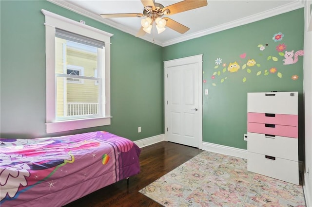 1212 Milan St, New Orleans, LA 70115 - bedroom featuring baseboards, wood finished floors, ornamental molding, and a ceiling fan
