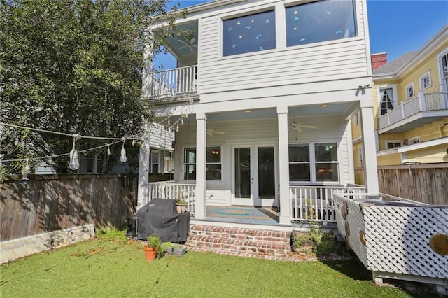 1212 Milan St, New Orleans, LA 70115 - rear view of house with a ceiling fan, a balcony, and french doors