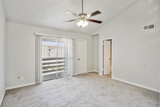 4218 Hessmer Ave Unit 309, Metairie, LA 70002 - carpeted spare room featuring a ceiling fan, lofted ceiling, baseboards, and a textured ceiling