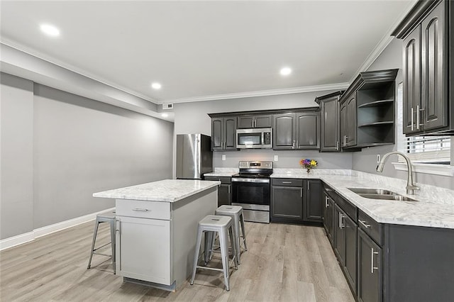 263638 Flood St, New Orleans, LA 70117 - kitchen featuring stainless steel appliances, a breakfast bar area, open shelves, a center island, and ornamental molding