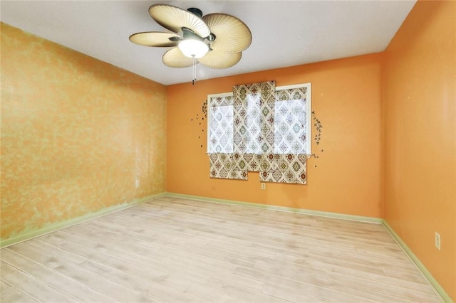 5238 Macarthur Blvd, New Orleans, LA 70131 - unfurnished room with wood finished floors, ceiling fan, and baseboards