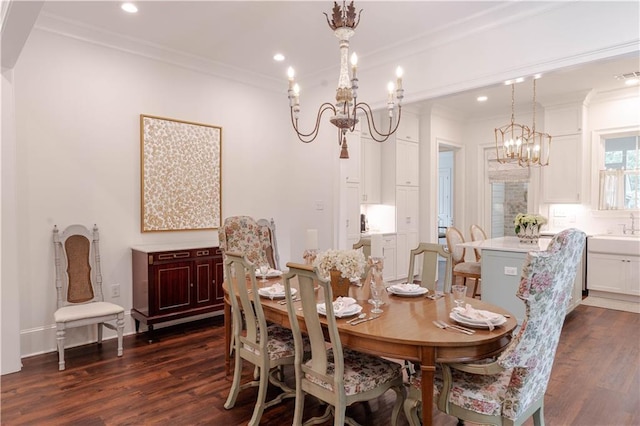 1302 W 23rd Ave, Covington, LA 70433 - dining space with a chandelier, dark wood-style floors, recessed lighting, and crown molding