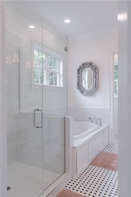 1302 W 23rd Ave, Covington, LA 70433 - full bath featuring a garden tub, a shower stall, recessed lighting, and ornamental molding