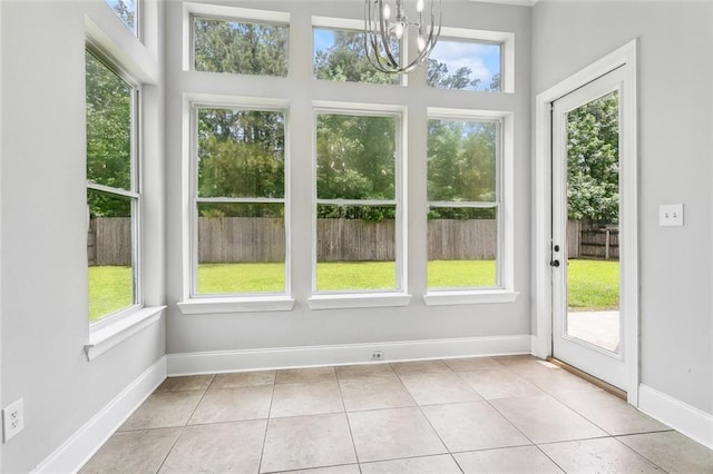 322 Palermo Dr, Slidell, LA 70458 - unfurnished sunroom with plenty of natural light and a chandelier